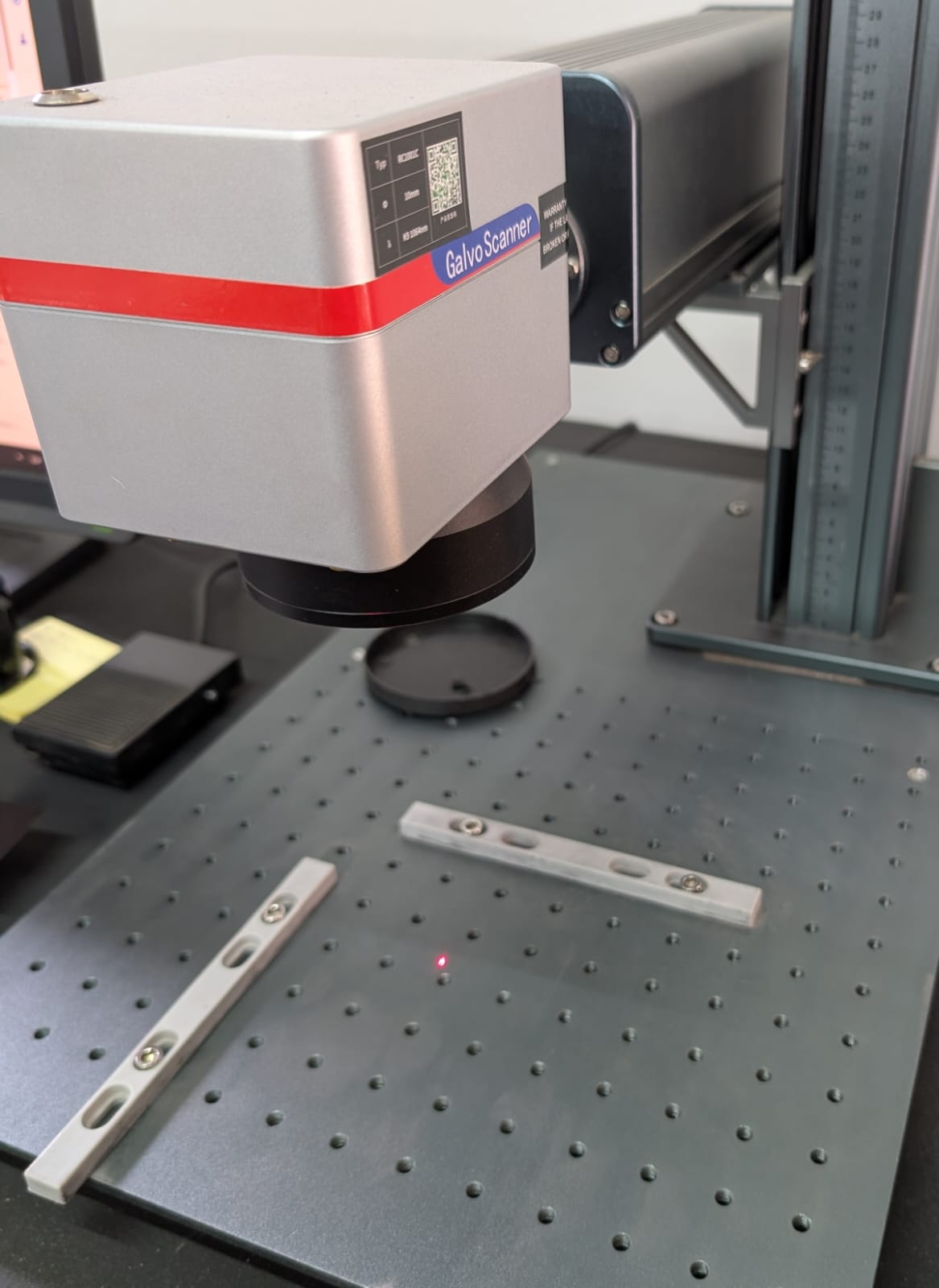 Laser engraving machine for piece identification.